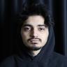 Görkem YILDIZ, UI/UX Team Leader at BUL, headshot with dark hair and wearing a hooded sweatshirt.